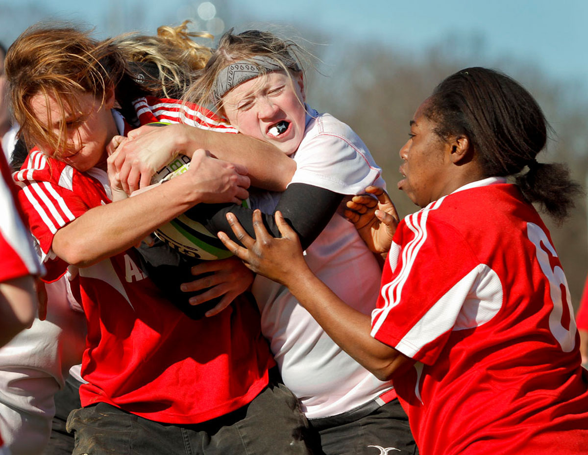 Christina Bradley fights for the ball during the Women's Club Rugby Team's 10-69 loss to the University of Alabama Jan. 22, 2012, at the Preston Intramural Complex at Western Kentucky University in Bowling Green.